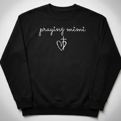 Simple white T-shirt featuring a heart and cross with 'praying mimi' text — printed on a unisex sweatshirt