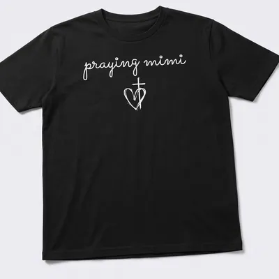 Simple white T-shirt featuring a heart and cross with 'praying mimi' text