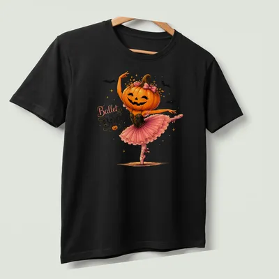 Whimsical illustration of a pumpkin ballerina wearing a pink tutu with the text 'Ballet of Boo' — printed on a unisex t-shirt (angled view)