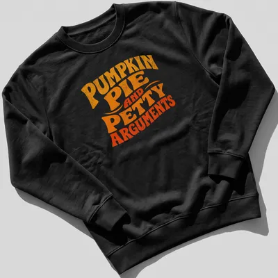 Retro distressed shirt featuring pumpkin pie and humorous text about petty arguments — printed on a unisex sweatshirt