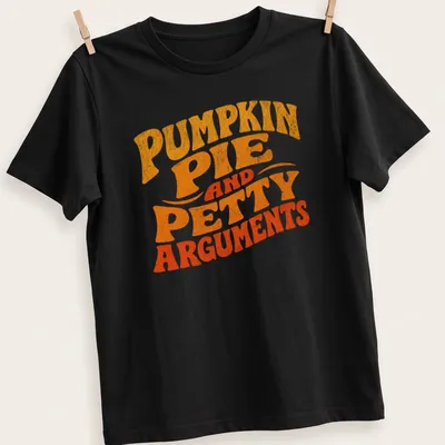 Retro distressed shirt featuring pumpkin pie and humorous text about petty arguments