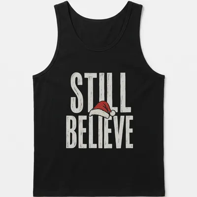 Vintage distressed t-shirt featuring a Santa hat and the phrase 'Still Believe' in bold letters. — printed on a tank top