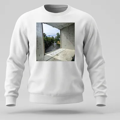 Photographic print of a scenic view through a window frame featuring nature — printed on a unisex sweatshirt
