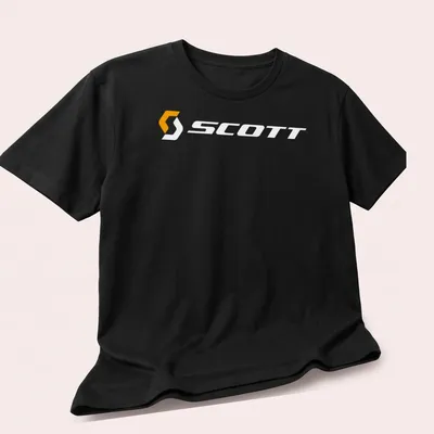 Scott bike logo printed in orange and white on a — printed on a unisex t-shirt (angled view)