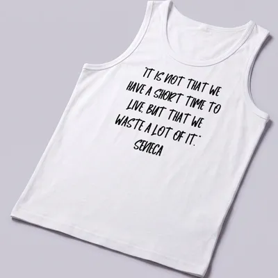 Typography t-shirt featuring Seneca's quote about time management in modern script. — printed on a tank top