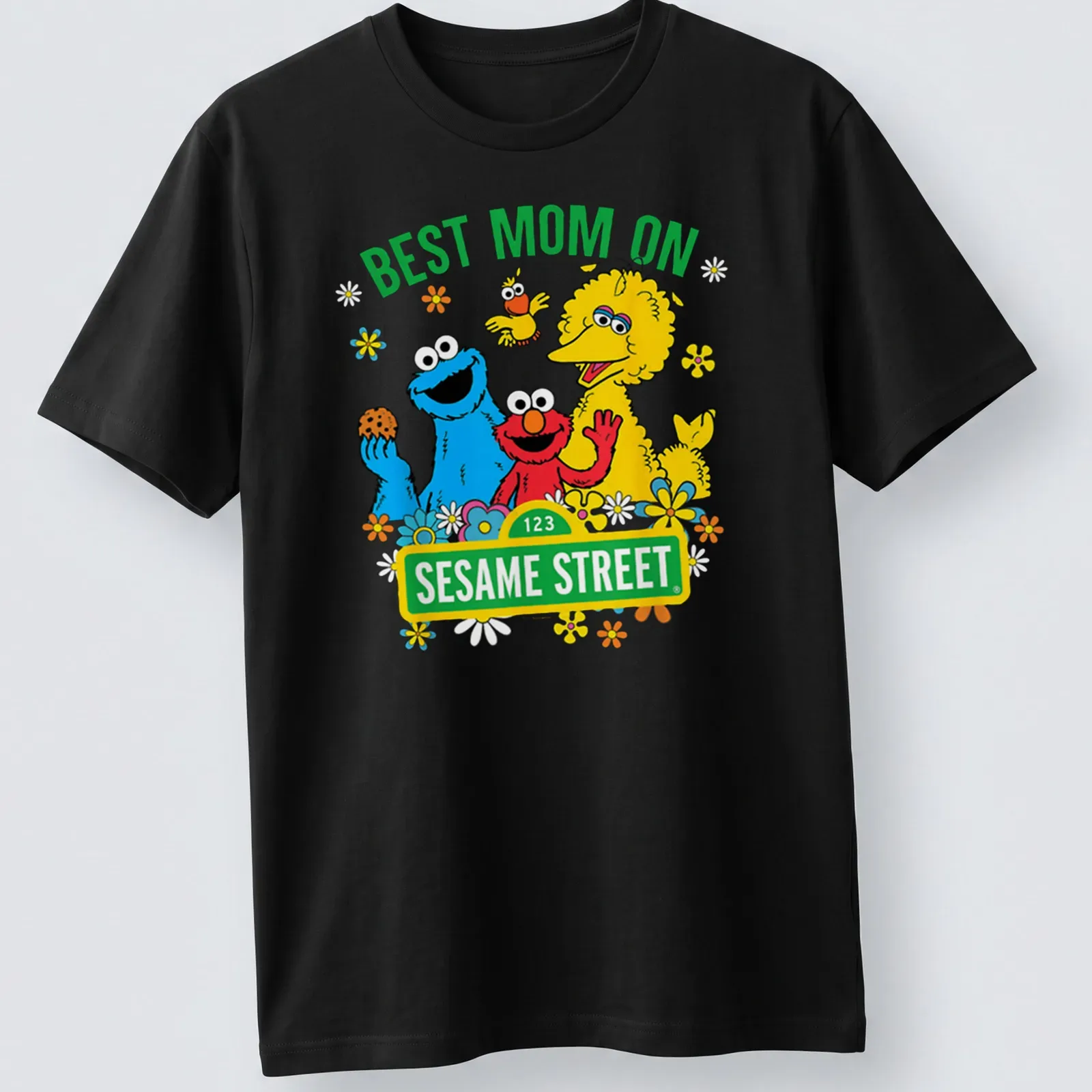 Colorful cartoon print of Sesame Street characters with text Best Mom On Sesame Street — printed on a unisex t-shirt