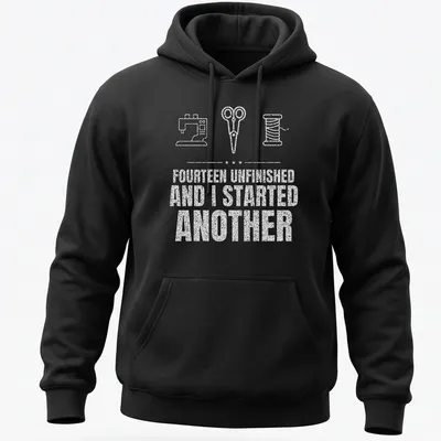 Typography t-shirt featuring a sewing machine, scissors, and a spool with humorous text — printed on a unisex hoodie