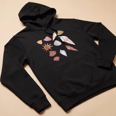 Watercolor pattern featuring various shells in soft hues of pink, peach, beige, purple, and orange. — printed on a unisex hoodie