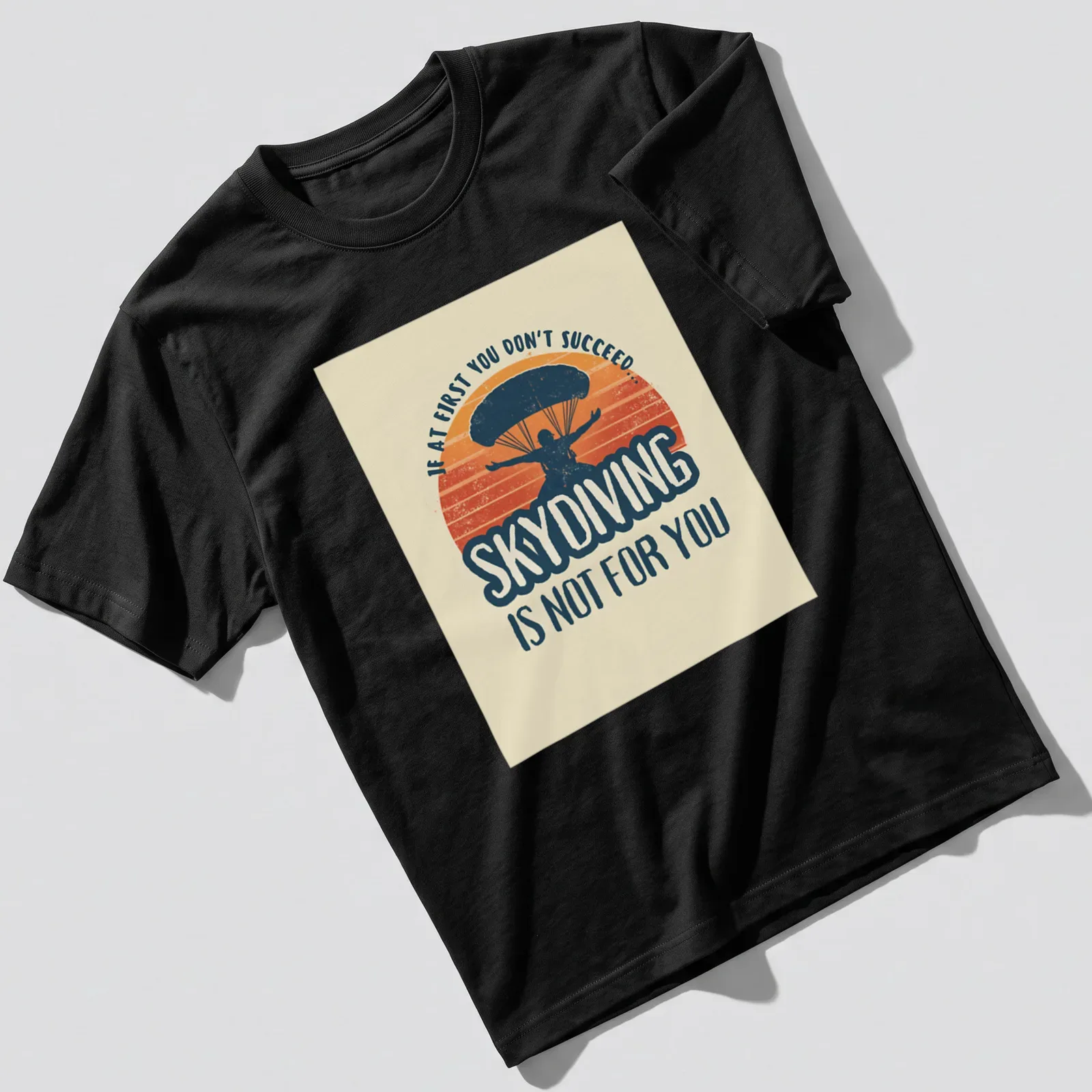 Vintage retro t-shirt featuring a humorous skydiving quote with a skydiver graphic — printed on a unisex t-shirt