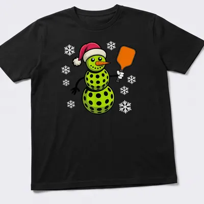 Cartoon snowman playing pickleball in red and green with festive colors