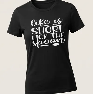 Playful design of a spoon with text 'Life Is Short Lick The Spoon' in black and white. — printed on a women's shirt