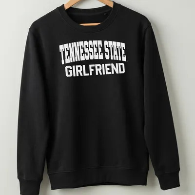 Bold collegiate print of Tennessee State Girlfriend text in white — printed on a unisex sweatshirt