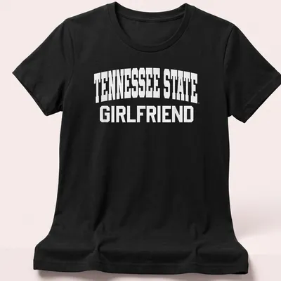 Bold collegiate print of Tennessee State Girlfriend text in white — printed on a women's shirt
