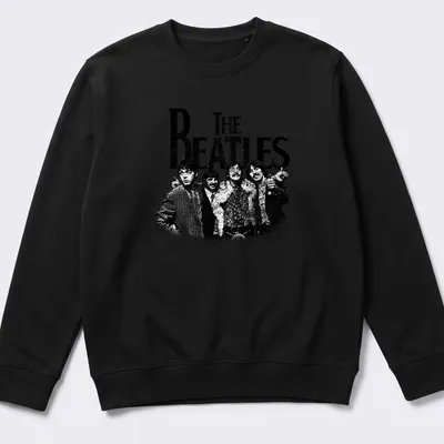 Vintage distressed t-shirt featuring bold text of 'THE BEATLES' in black and white — printed on a unisex sweatshirt