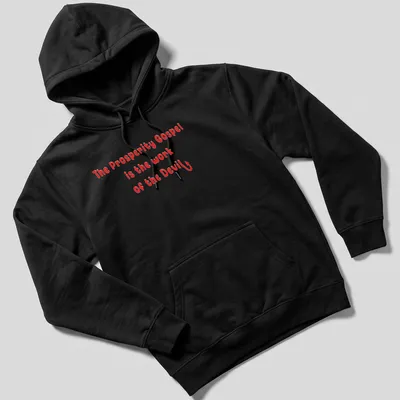 Bold typography design stating 'The Prosperity Gospel is the work of the Devil' in red and white. — printed on a unisex hoodie