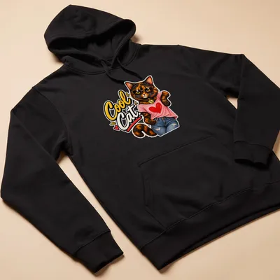 Cartoon tortoiseshell cat with playful expression and text 'Cool Cat.' — printed on a unisex hoodie