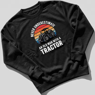 Retro distressed Tractor Driver shirt with colorful text and tractor graphic — printed on a unisex sweatshirt
