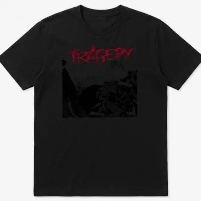 Grunge style shirt featuring the word TRAGEDY over rubble and a figure in black, red, and white.