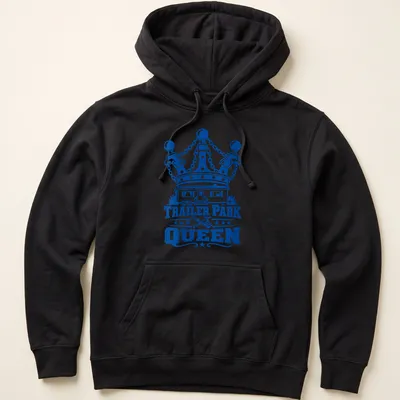 Bold graphic Tee with the text Trailer Park Queen above a cartoon trailer park and crown — printed on a unisex hoodie
