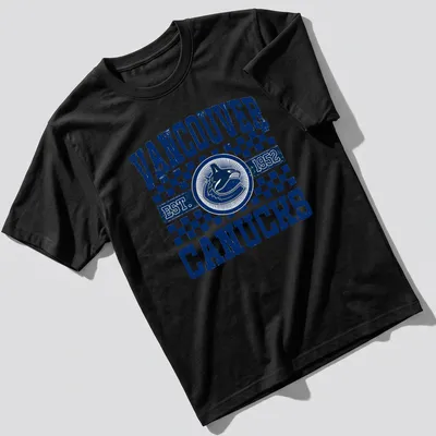 Vintage distressed Vancouver Canucks T-shirt with bold lettering