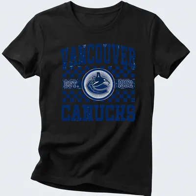 Vintage distressed Vancouver Canucks T-shirt with bold lettering — printed on a women's shirt
