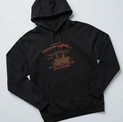 Vintage rowboat scene with 'Greetings from Widow's Bay' text in red, white, and black — printed on a unisex hoodie