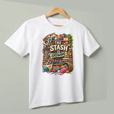Colorful illustration of a cat surrounded by yarn and knitting supplies with printed text above. — printed on a unisex t-shirt (angled view)