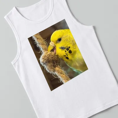 Realistic photograph of a yellow budgerigar perched on a rope against natural colors — printed on a tank top